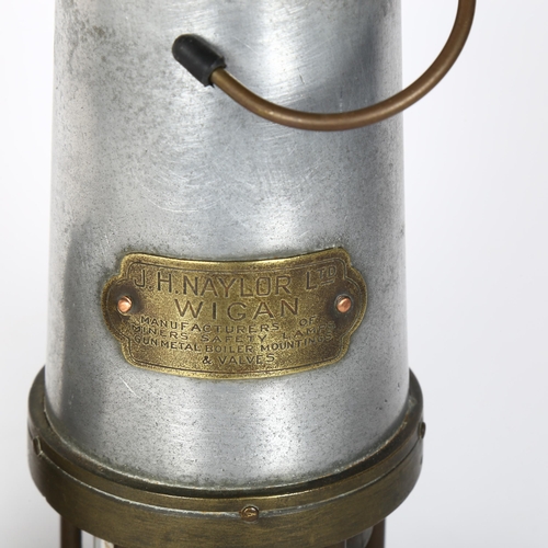 207 - J H Taylor Ltd Wigan, a brass miner's lamp, and another (2)