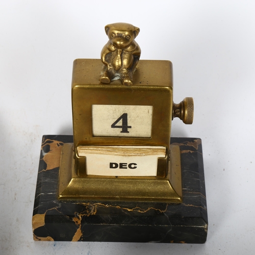 208 - An Art Deco black marble desk set, comprising letter rack, desk calendar, inkwell, blotter, and seal... 