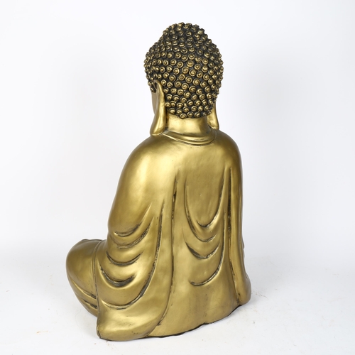 212 - A large composite gilded figure of a seated Buddha, height 55cm