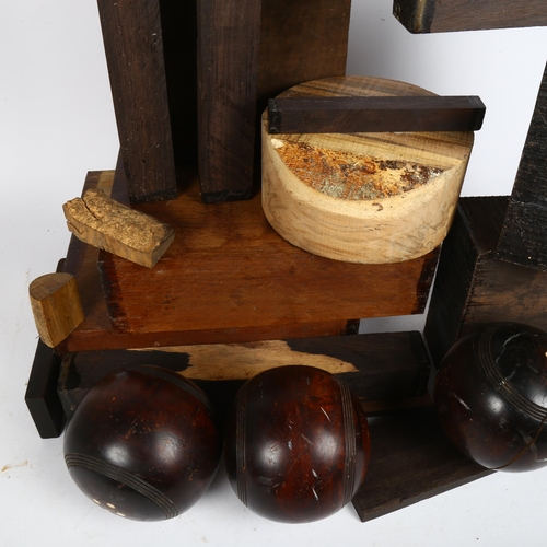 228 - A quantity of wood turner's wood, to include African blackwood, lignum bowls, and chacate preto wood... 