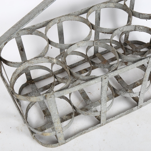 229 - A French galvanised milk bottle carrier