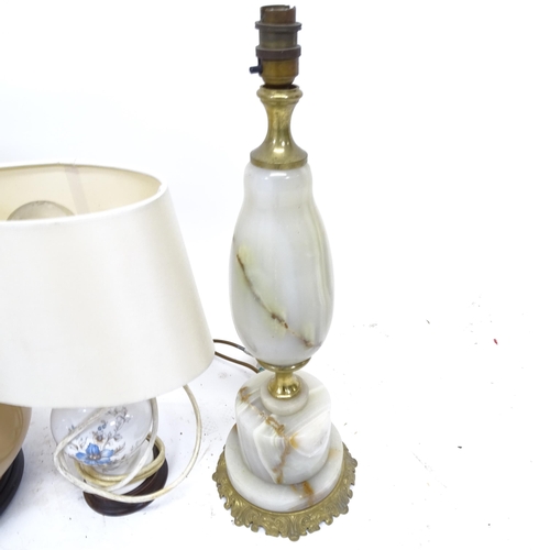 2538 - An alabaster turned table lamp and shade, a ceramic glazed table lamp and shade, a brass table lamp ... 