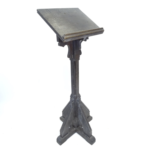 2550 - A Victorian oak Gothic lectern, W49cm, H143cm