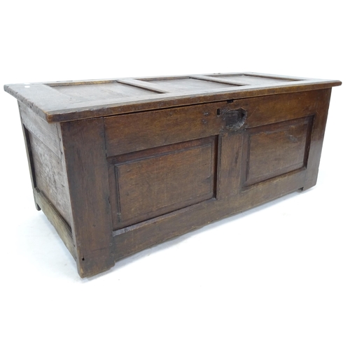 2556 - An Antique mahogany panelled coffer, W106cm, H44cm, D47cm