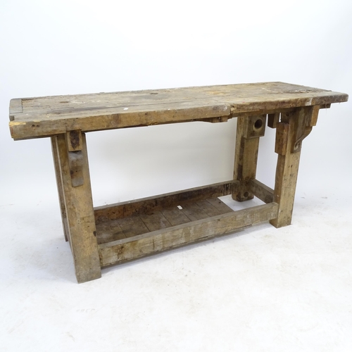 2568 - A Vintage pine work bench, L145cm, H73cm, D51cm