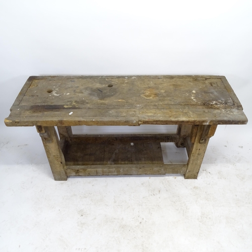 2568 - A Vintage pine work bench, L145cm, H73cm, D51cm