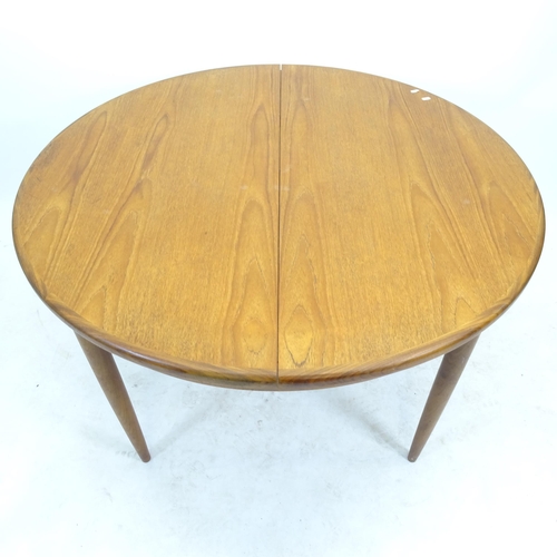 2576 - A mid-century G Plan circular extending dining table, D122cm, H72cm, and 6 x G Plan chairs