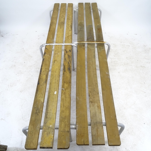 2580 - A pair of mid-century teak slatted benches, on tubular steel frames, L202cm, H45cm, D41cm