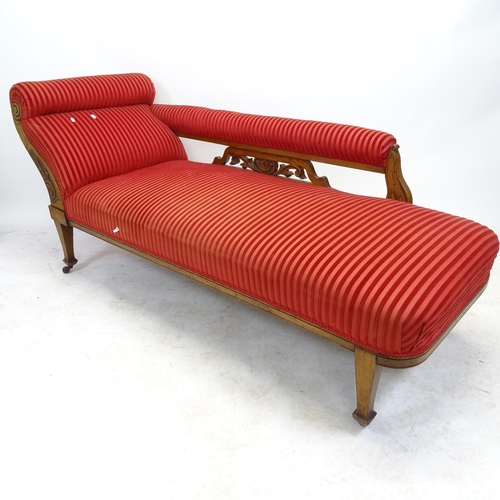 2582 - An early 20th century oak upholstered chaise longue, L178cm