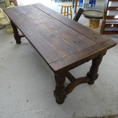 2585 - A 19th century oak plank-top dining table, on baluster turned legs, with H-shaped stretcher, L202cm,... 