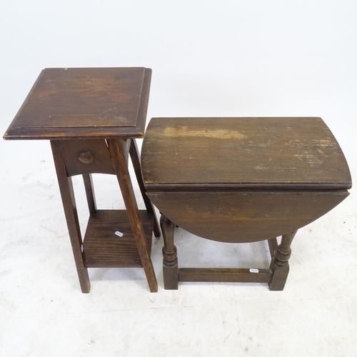 2589 - A small oak drop leaf table, L48cm, H46cm, D26cm, and an oak jardiniere stand, W25cm, H63cm