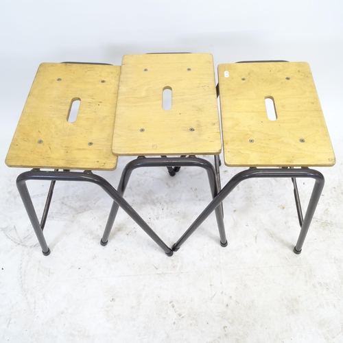 2591 - A set of 3 Remploy stacking stools, with plywood seats on tubular metal frame, and a mahogany tilt t... 