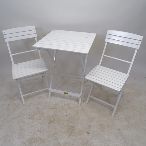 2597 - A modern white painted folding garden table, W55cm, H73cm, with label for V & N Furniture, and 2 mat... 