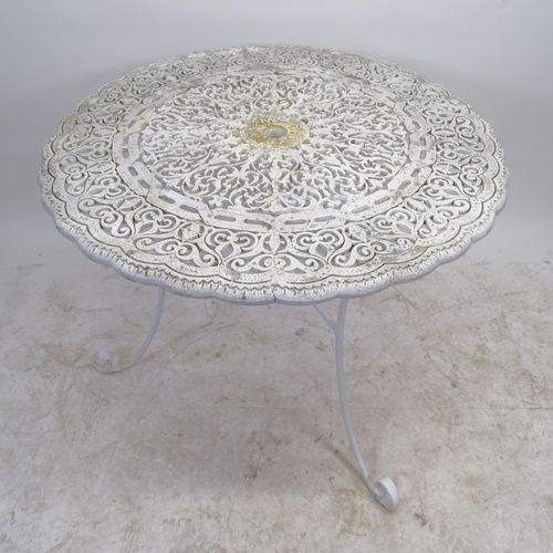 2607 - A white painted circular-top metal garden table, D90cm, H78cm