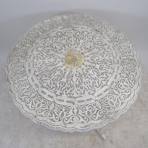 2607 - A white painted circular-top metal garden table, D90cm, H78cm