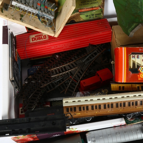 422 - 2 boxes of Tri-ang, Merit and Hornby, rolling stock and building etc