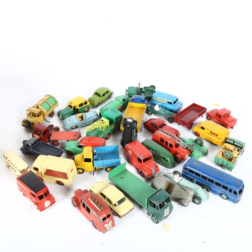 436 - A collection of Vintage Dinky toys, including vans, fire engines, and other diecast vehicles