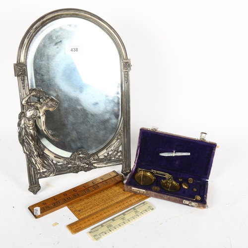 438 - A cased set of brass weights, and an Art Nouveau style strut mirror, height 36cm