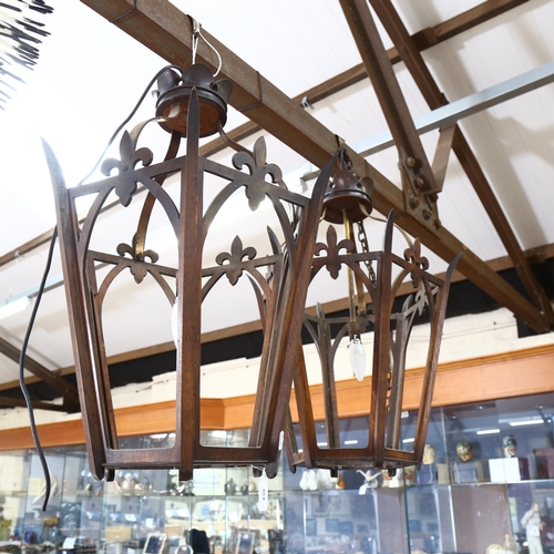 439 - A pair of Continental hexagonal wooden-framed lanterns, complete with glass panels, diameter 36cm