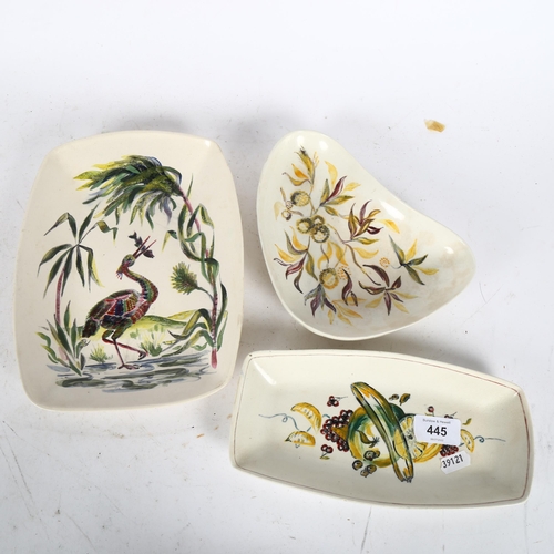 445 - 3 shallow dishes with painted designs of a heron and fruit, largest 25cm, signed TJR?