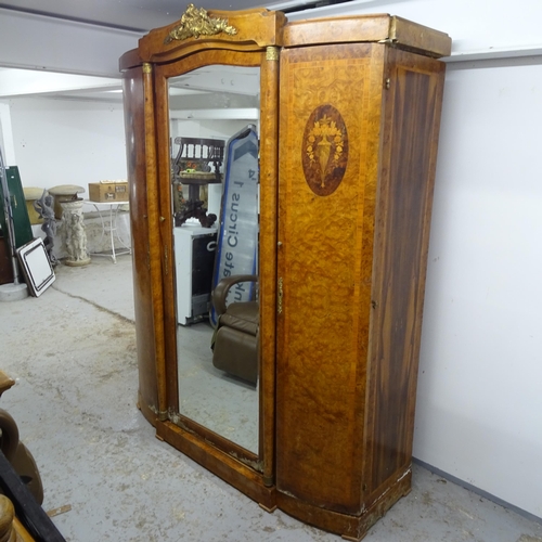 2617 - An Antique Continental crossbanded figured walnut armoire, with central bevel-mirror door, flanked b... 