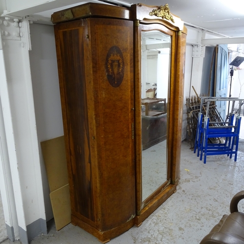 2617 - An Antique Continental crossbanded figured walnut armoire, with central bevel-mirror door, flanked b... 