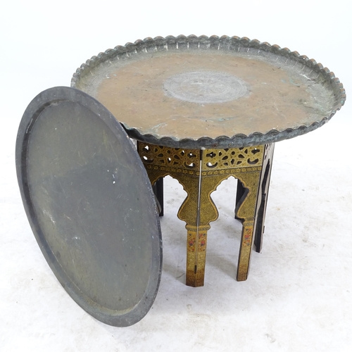 2625 - An Eastern design copper and brass tray-top table, on lacquered base, D70cm, H56cm, and another pain... 