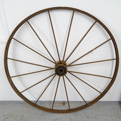 2633 - An Antique cast-iron carriage wheel, D141cm