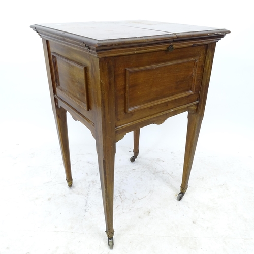 2638 - A reproduction mahogany metamorphic dressing/occasional table, with fold-out rising interior, W54cm,... 