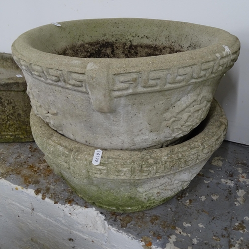 2666 - A pair of weathered concrete circular garden planters, W42cm, H22cm