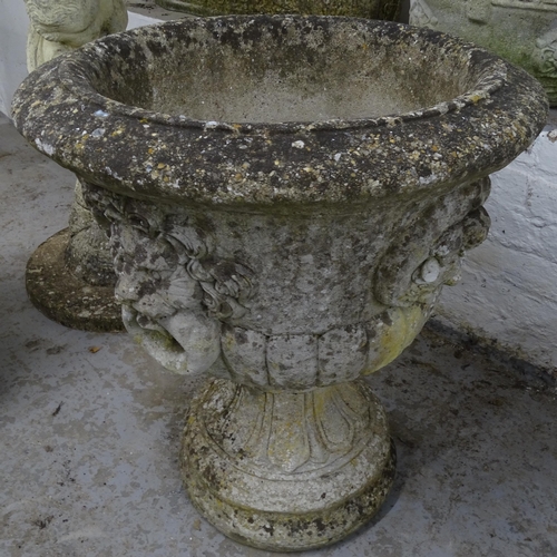 2667 - A weathered concrete circular garden urn on stand, D54cm, H65cm