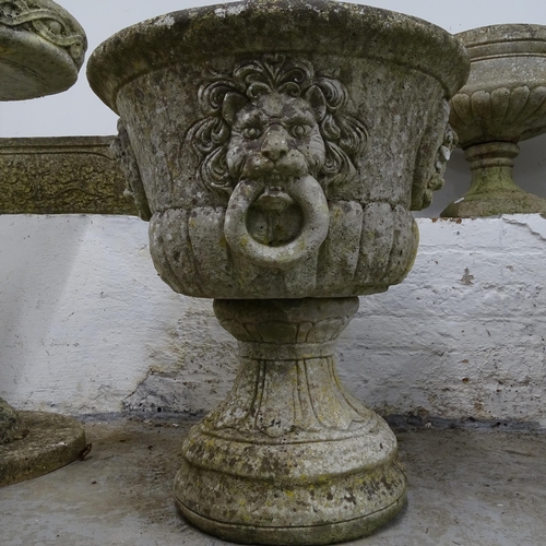 2667 - A weathered concrete circular garden urn on stand, D54cm, H65cm