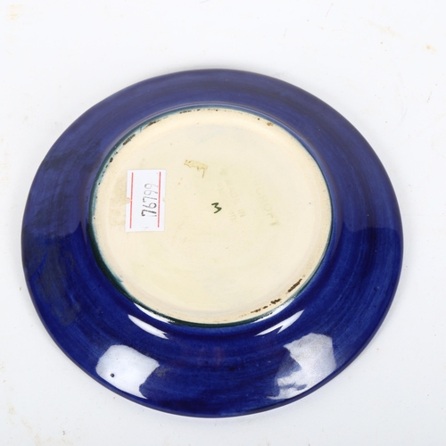 616 - MOORCROFT - a blue ground Hibiscus pin dish