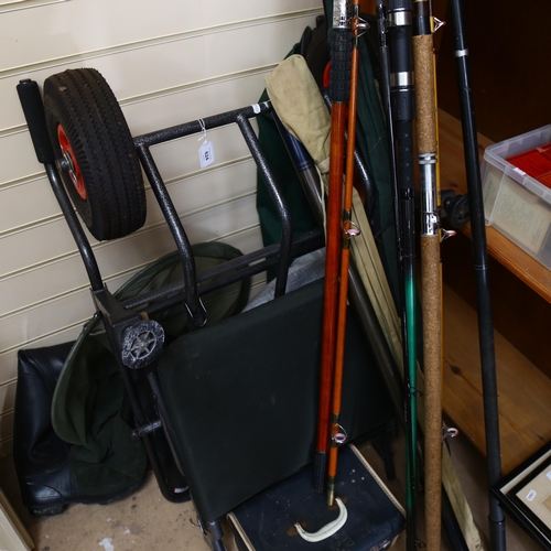 624 - Carbon fibre sea fishing rods, others, Hunter waders size 9, landing nets etc