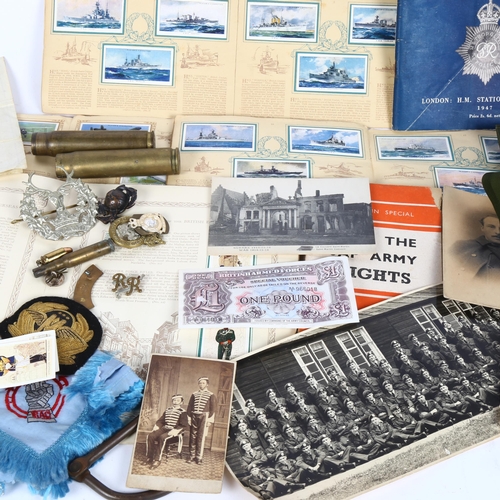 636 - Various war-related ephemera, including Metropolitan Police At War booklet, steel handcuff, Bydand c... 