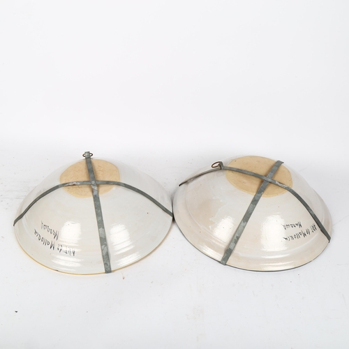 653 - A pair of painted bowls by Art De Mallorca, 53cm diameter