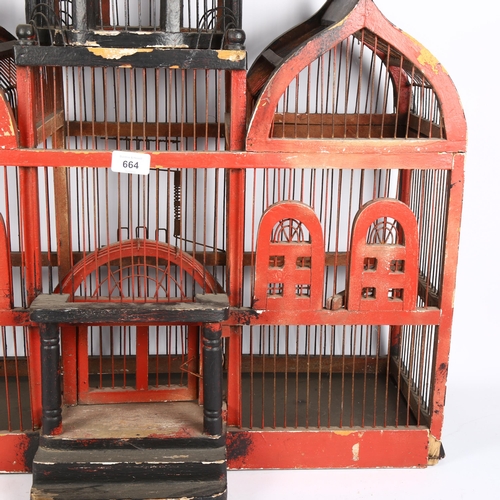 664 - A large Vintage painted wooden bird cage, width 68cm