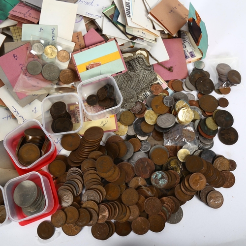 102 - A quantity of British postage stamps and coins