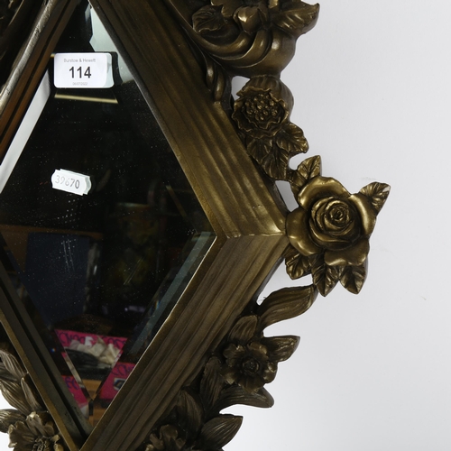 114 - A modern resin-framed diamond bevelled edge wall mirror, height 80cm