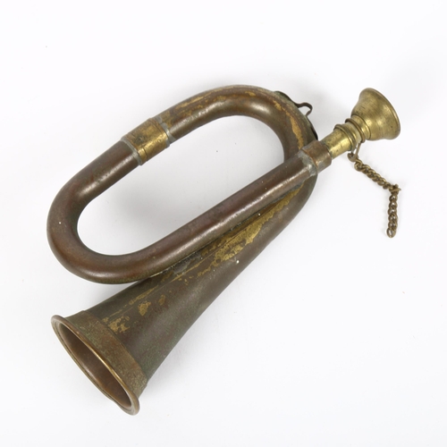 125 - A small copper and brass hunting bugle, length 14cm