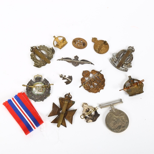 127 - Various military medals and badges, including George VI War medal with box and paper stubs, to 21578... 