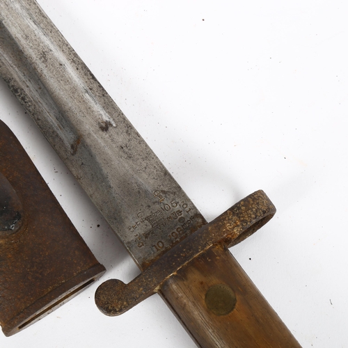 147 - A British Army bayonet and scabbard, blade length 30cm