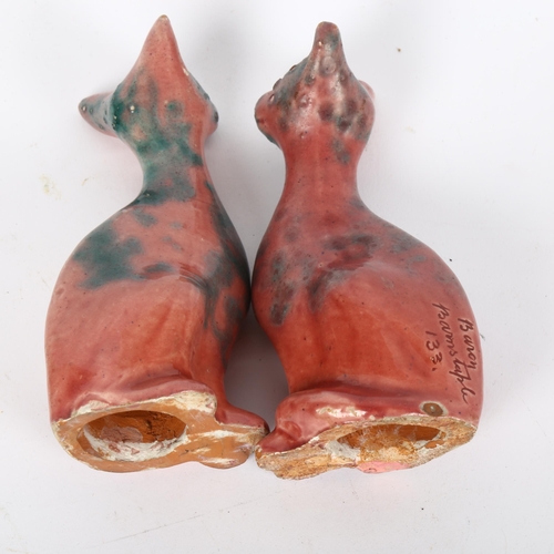 164 - A pair of Brannam William Baron Barnstaple pottery seated cats, signed, marked 133, height 11cm