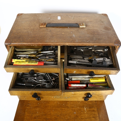 189 - An early 20th century engineer's tool chest, complete with tools, drill bits, gauges etc