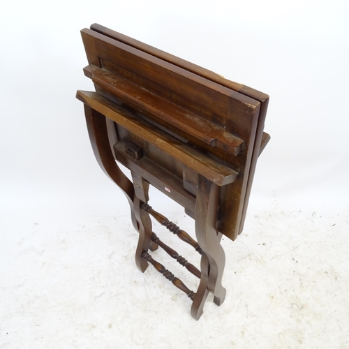 2734 - A reproduction mahogany folding coaching table on X-framed base, L82cm, H69cm, D46cm