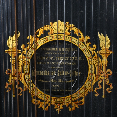 254 - An Antique ebonised and gilded zither, by the U.S Guitar Zither Company, original box