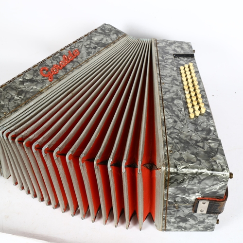 255 - A Vintage Geraldo piano accordion, cased