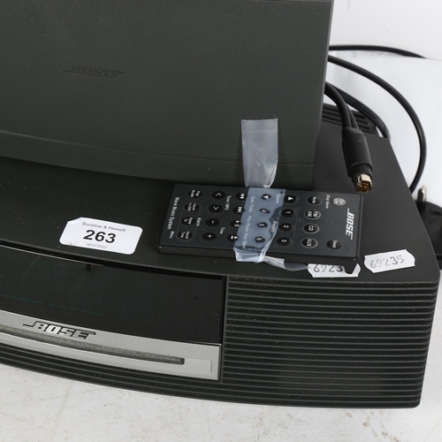 263 - BOSE - a Bose Wave music system, and a Bose Wave DAB module, with remote control, GWO