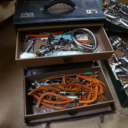 276 - 2 trays of medical instruments, and a leather doctor's case, with 3 fitted drawers and implements