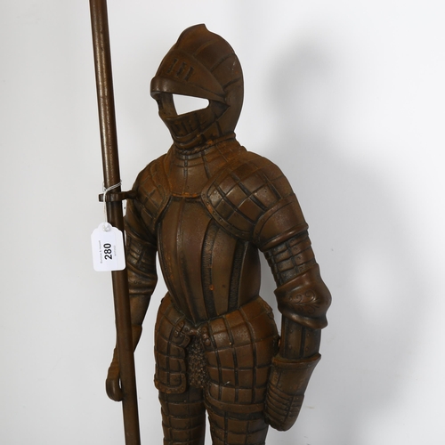 280 - A cast-iron knight figure companion set (no tools), on stepped plinth base, height 90cm